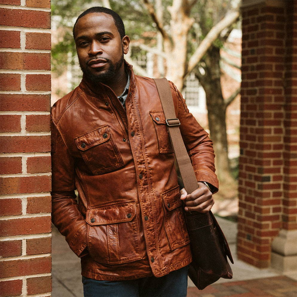 man breaking in a leather jacket